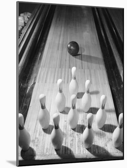 Bowling Ball Heading Toward Pins-Philip Gendreau-Mounted Photographic Print