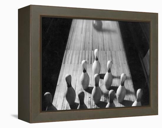 Bowling Ball Rolling Toward Pins-Philip Gendreau-Framed Premier Image Canvas