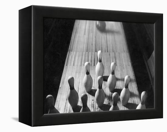 Bowling Ball Rolling Toward Pins-Philip Gendreau-Framed Premier Image Canvas