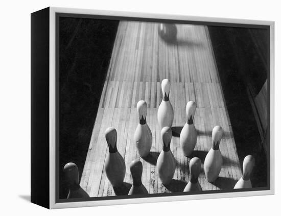 Bowling Ball Rolling Toward Pins-Philip Gendreau-Framed Premier Image Canvas