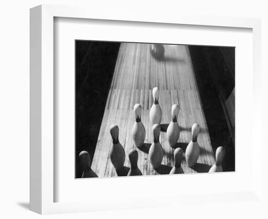 Bowling Ball Rolling Toward Pins-Philip Gendreau-Framed Photographic Print