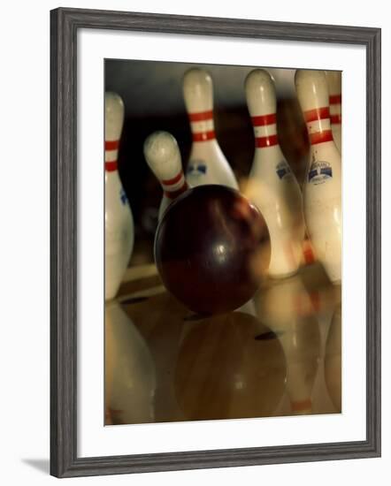 Bowling Ball Striking Pins-null-Framed Photographic Print