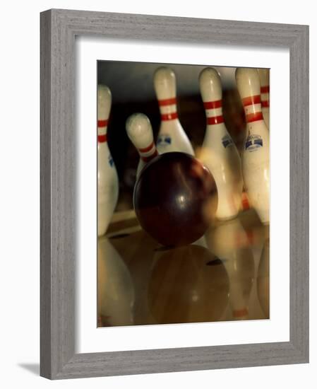 Bowling Ball Striking Pins-null-Framed Photographic Print