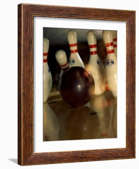 Bowling Ball Striking Pins-null-Framed Photographic Print