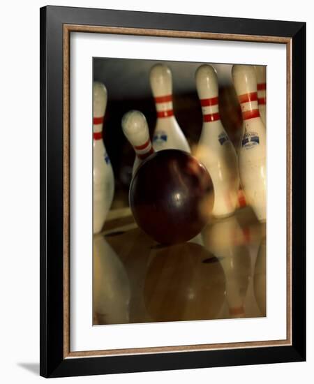 Bowling Ball Striking Pins-null-Framed Photographic Print