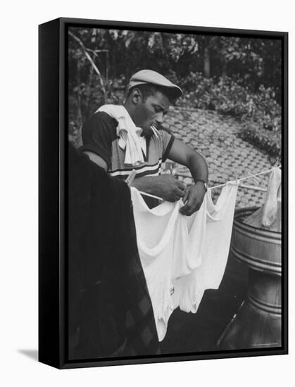Boxer Floyd Patterson Doing Laundry at Training Quarters Near Newtown-George Silk-Framed Premier Image Canvas