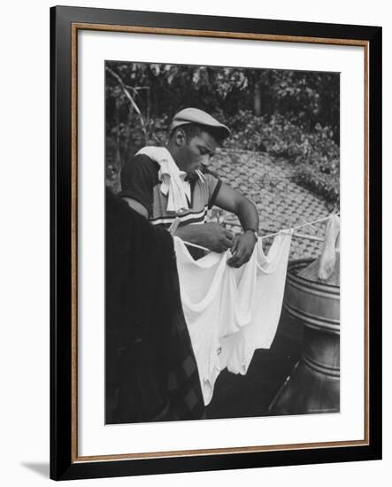 Boxer Floyd Patterson Doing Laundry at Training Quarters Near Newtown-George Silk-Framed Premium Photographic Print