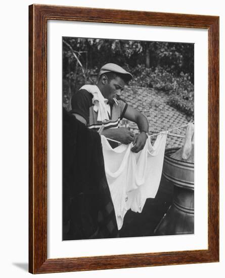 Boxer Floyd Patterson Doing Laundry at Training Quarters Near Newtown-George Silk-Framed Premium Photographic Print