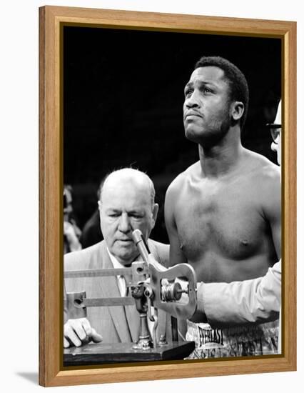 Boxer Joe Frazier at the Weigh in for His Fight Against Muhammad Ali-John Shearer-Framed Premier Image Canvas