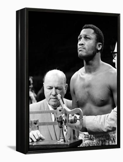 Boxer Joe Frazier at the Weigh in for His Fight Against Muhammad Ali-John Shearer-Framed Premier Image Canvas