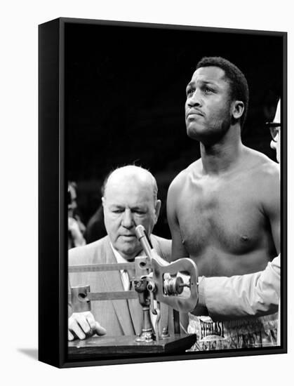 Boxer Joe Frazier at the Weigh in for His Fight Against Muhammad Ali-John Shearer-Framed Premier Image Canvas