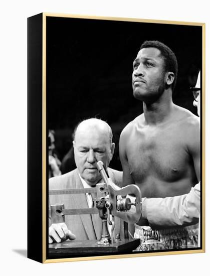 Boxer Joe Frazier at the Weigh in for His Fight Against Muhammad Ali-John Shearer-Framed Premier Image Canvas