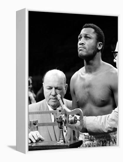 Boxer Joe Frazier at the Weigh in for His Fight Against Muhammad Ali-John Shearer-Framed Premier Image Canvas