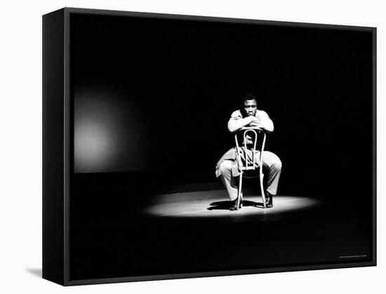 Boxer Joe Frazier Sitting on a Chair under a Spotlight-John Shearer-Framed Premier Image Canvas