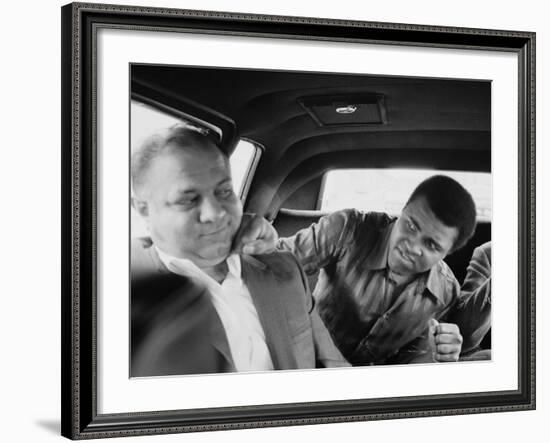 Boxer Muhammad Ali Clowning Around with His Trainer Bundini Brown-John Shearer-Framed Premium Photographic Print