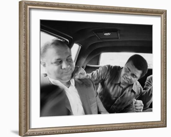 Boxer Muhammad Ali Clowning Around with His Trainer Bundini Brown-John Shearer-Framed Premium Photographic Print