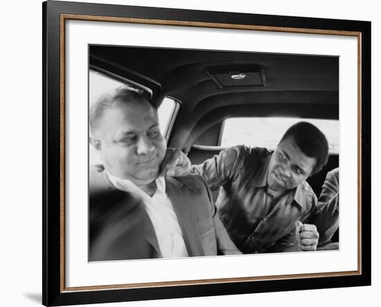 Boxer Muhammad Ali Clowning Around with His Trainer Bundini Brown-John Shearer-Framed Premium Photographic Print