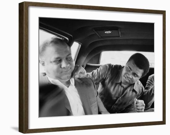 Boxer Muhammad Ali Clowning Around with His Trainer Bundini Brown-John Shearer-Framed Premium Photographic Print