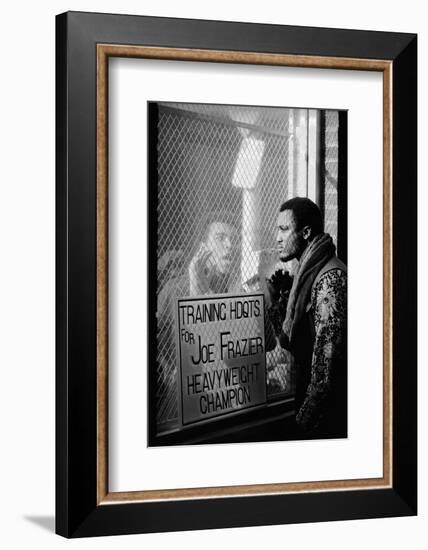 Boxer Muhammad Ali Taunting Boxer Joe Frazier During Training for Their Fight-John Shearer-Framed Photographic Print