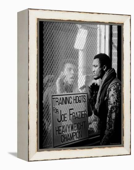 Boxer Muhammad Ali Taunting Rival Joe Frazier at Frazier's Training Headquarters-John Shearer-Framed Premier Image Canvas