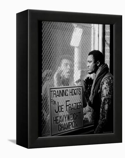 Boxer Muhammad Ali Taunting Rival Joe Frazier at Frazier's Training Headquarters-John Shearer-Framed Premier Image Canvas