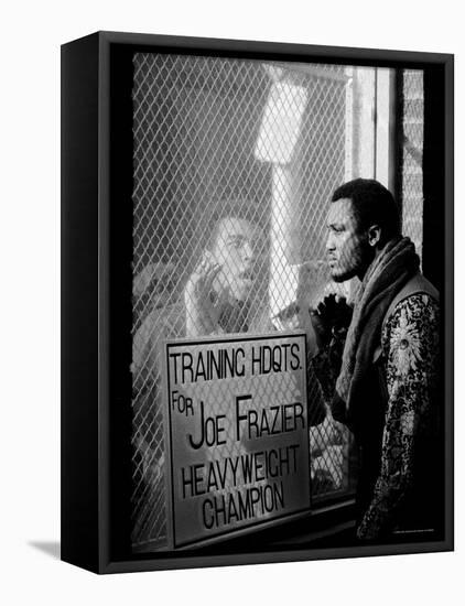Boxer Muhammad Ali Taunting Rival Joe Frazier at Frazier's Training Headquarters-John Shearer-Framed Premier Image Canvas