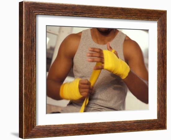 Boxer Wrapping His Hands-Chris Trotman-Framed Photographic Print