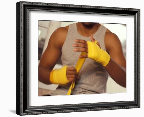 Boxer Wrapping His Hands-Chris Trotman-Framed Photographic Print