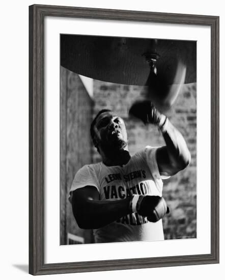 Boxing Champ Joe Frazier Working Out for His Scheduled Fight Against Muhammad Ali-John Shearer-Framed Premium Photographic Print