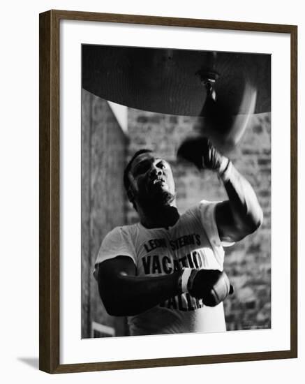 Boxing Champ Joe Frazier Working Out for His Scheduled Fight Against Muhammad Ali-John Shearer-Framed Premium Photographic Print
