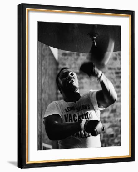 Boxing Champ Joe Frazier Working Out for His Scheduled Fight Against Muhammad Ali-John Shearer-Framed Premium Photographic Print