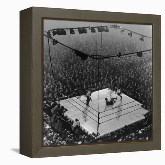 Boxing Ring as Heavyweight Champion Joe Louis Lies on Canvas, after Floored by Jersey Joe Walcott-Gjon Mili-Framed Premier Image Canvas