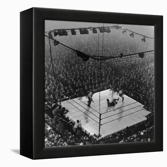 Boxing Ring as Heavyweight Champion Joe Louis Lies on Canvas, after Floored by Jersey Joe Walcott-Gjon Mili-Framed Premier Image Canvas