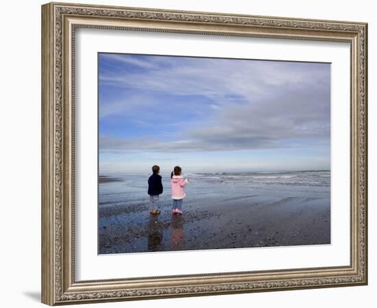 Boy Aged Four and Girl Aged Three on a Black Volcanic Sand Beach in Manawatu, New Zealand-Don Smith-Framed Photographic Print