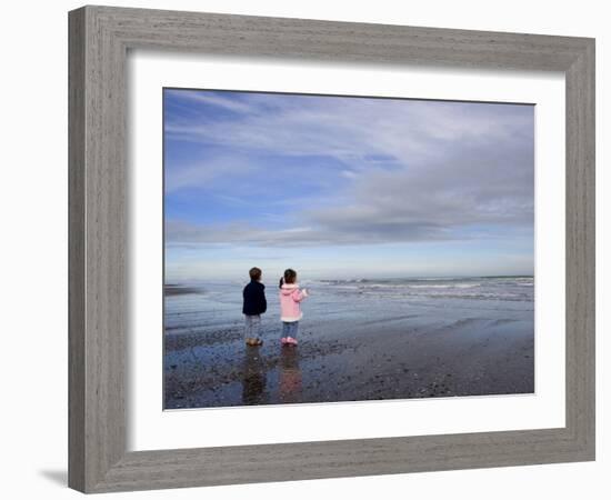 Boy Aged Four and Girl Aged Three on a Black Volcanic Sand Beach in Manawatu, New Zealand-Don Smith-Framed Photographic Print