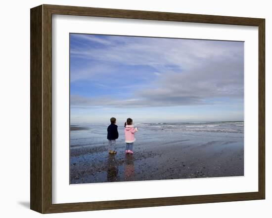 Boy Aged Four and Girl Aged Three on a Black Volcanic Sand Beach in Manawatu, New Zealand-Don Smith-Framed Photographic Print