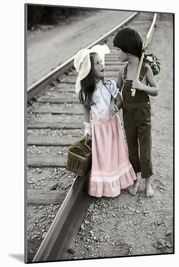 Boy and Girl Carrying Packs Walking by Railroad Tracks-Nora Hernandez-Mounted Giclee Print