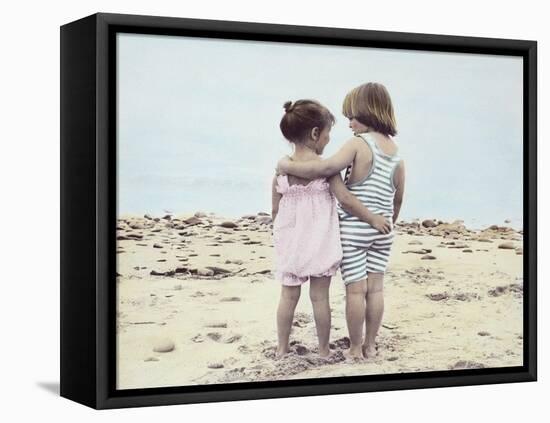 Boy and Girl with their Arms around Each Other on the Beach-Nora Hernandez-Framed Premier Image Canvas
