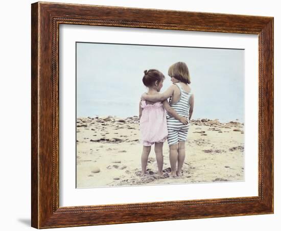 Boy and Girl with their Arms around Each Other on the Beach-Nora Hernandez-Framed Giclee Print