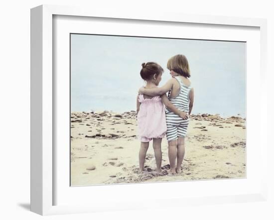 Boy and Girl with their Arms around Each Other on the Beach-Nora Hernandez-Framed Giclee Print