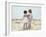 Boy and Girl with their Arms around Each Other on the Beach-Nora Hernandez-Framed Giclee Print