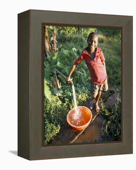 Boy at Water Tap, Chuka Village, Mount Kenya, Kenya, East Africa, Africa-Duncan Maxwell-Framed Premier Image Canvas