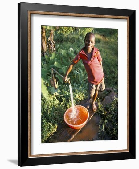 Boy at Water Tap, Chuka Village, Mount Kenya, Kenya, East Africa, Africa-Duncan Maxwell-Framed Photographic Print