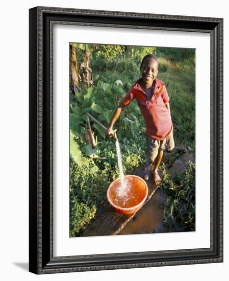 Boy at Water Tap, Chuka Village, Mount Kenya, Kenya, East Africa, Africa-Duncan Maxwell-Framed Photographic Print