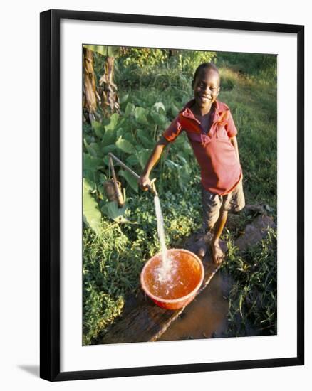 Boy at Water Tap, Chuka Village, Mount Kenya, Kenya, East Africa, Africa-Duncan Maxwell-Framed Photographic Print