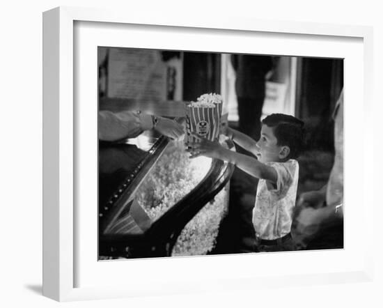 Boy Buying Popcorn at Movie Concession Stand-Peter Stackpole-Framed Photographic Print