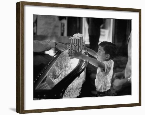 Boy Buying Popcorn at Movie Concession Stand-Peter Stackpole-Framed Photographic Print