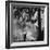 Boy Combining Play and Seasonal Chore, Stirring a Pile of Burning Leaves-Allan Grant-Framed Photographic Print