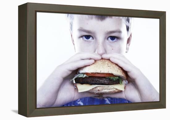 Boy Eating a Burger-Kevin Curtis-Framed Premier Image Canvas