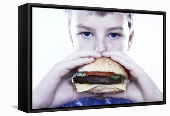 Boy Eating a Burger-Kevin Curtis-Framed Premier Image Canvas